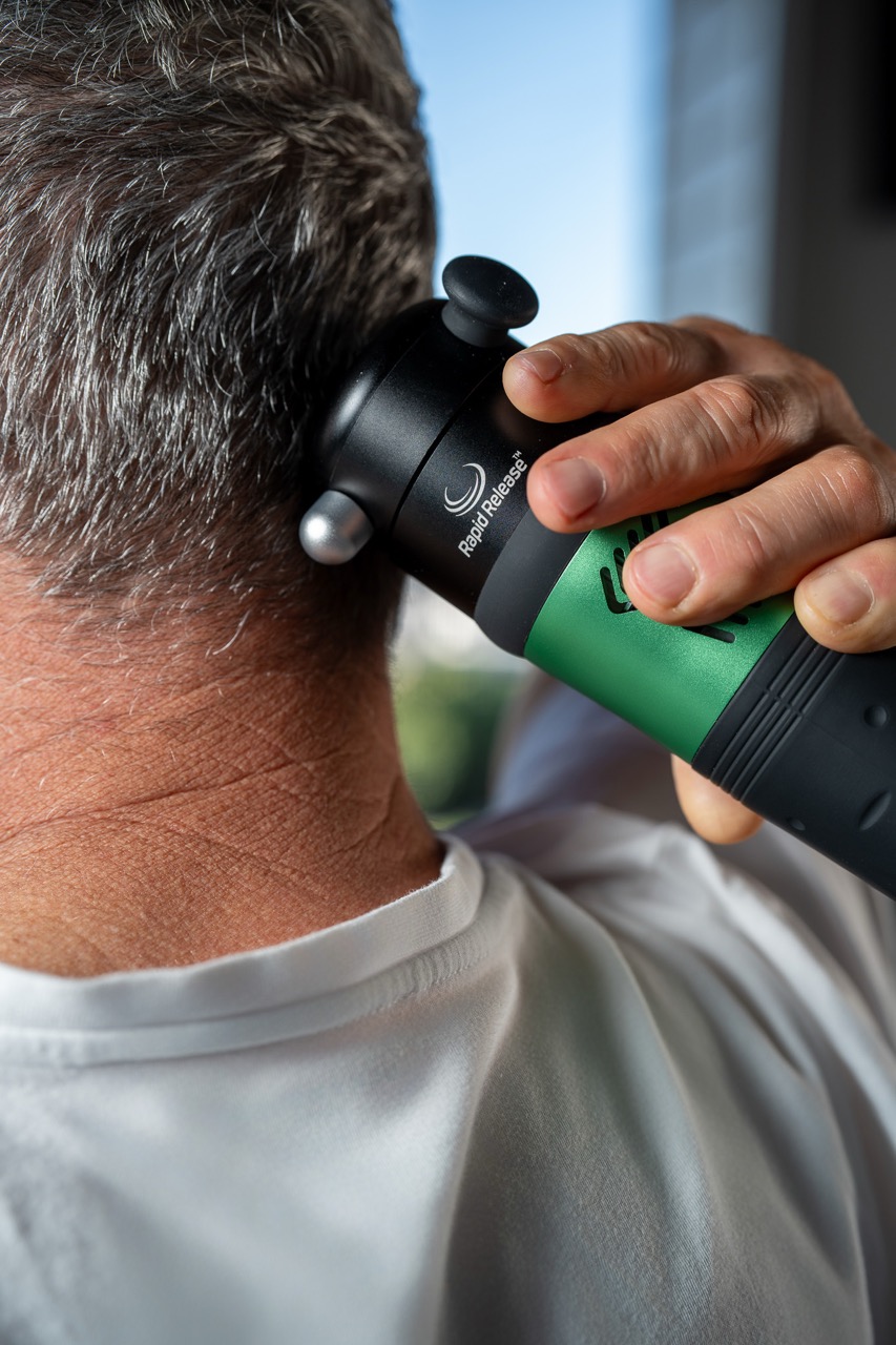 Close-up of the Rapid Release Therapy device applied to the neck