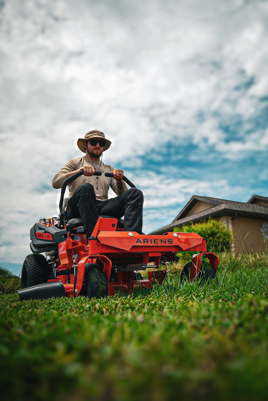 SouthShore LawnLife owner mowing in editorial action coverage