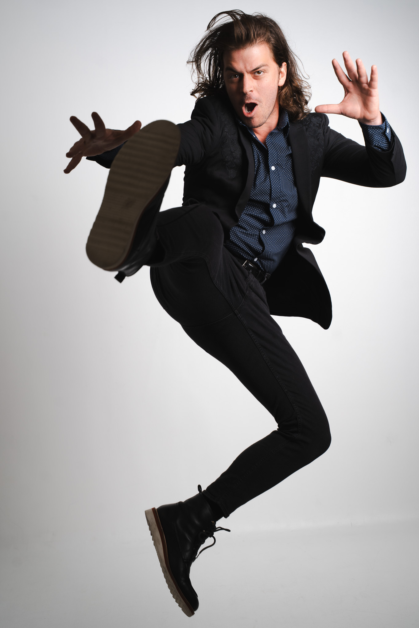Performer captured mid-motion in the studio